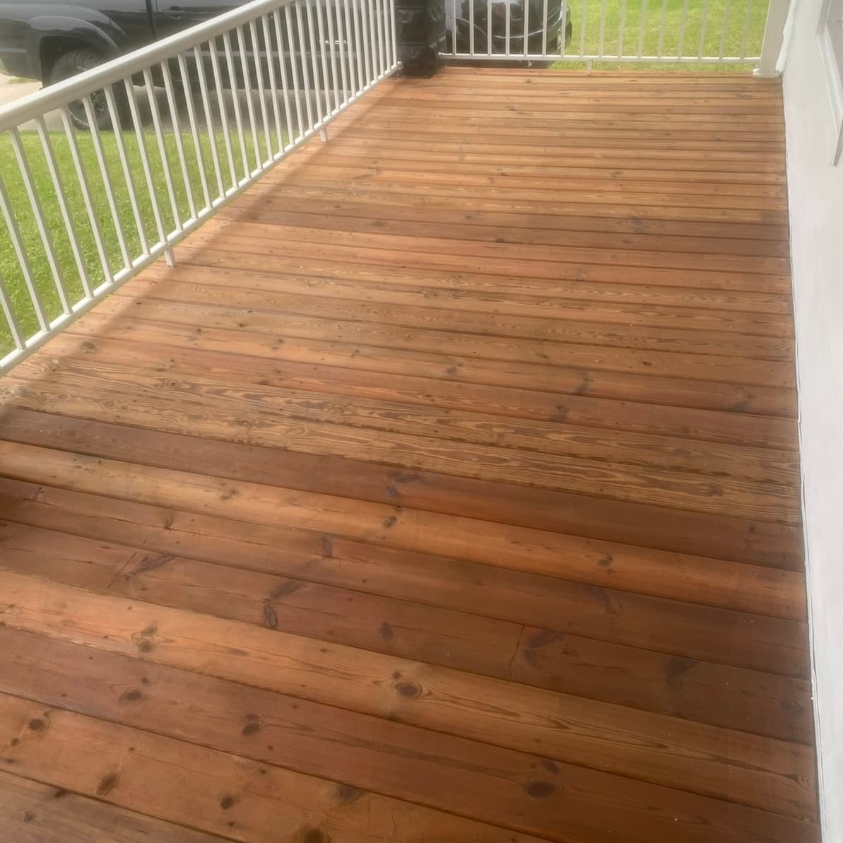 Clean deck after professional pressure washing in Davenport, IA
