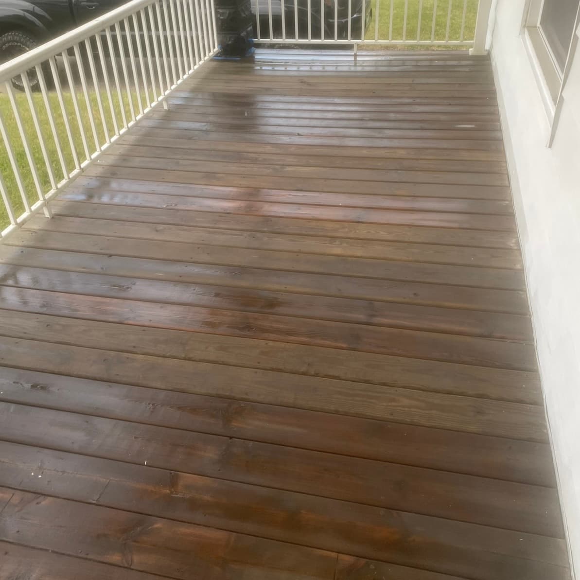 Dirty deck before pressure washing in Quad Cities